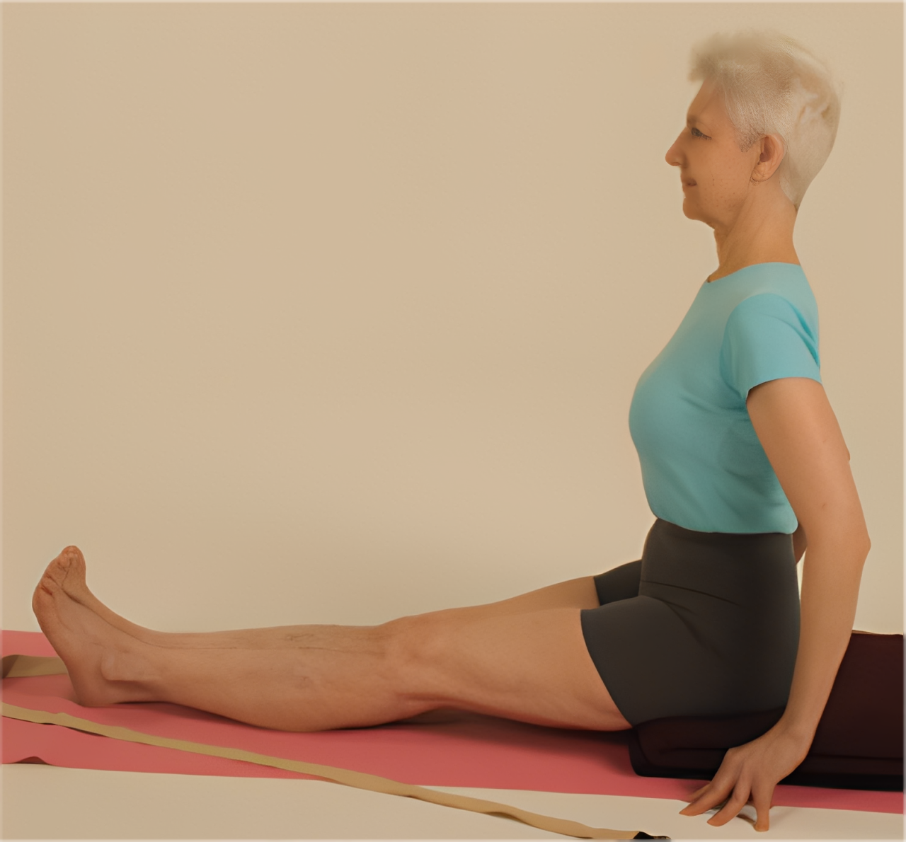 Yoga exercise on mat indoors