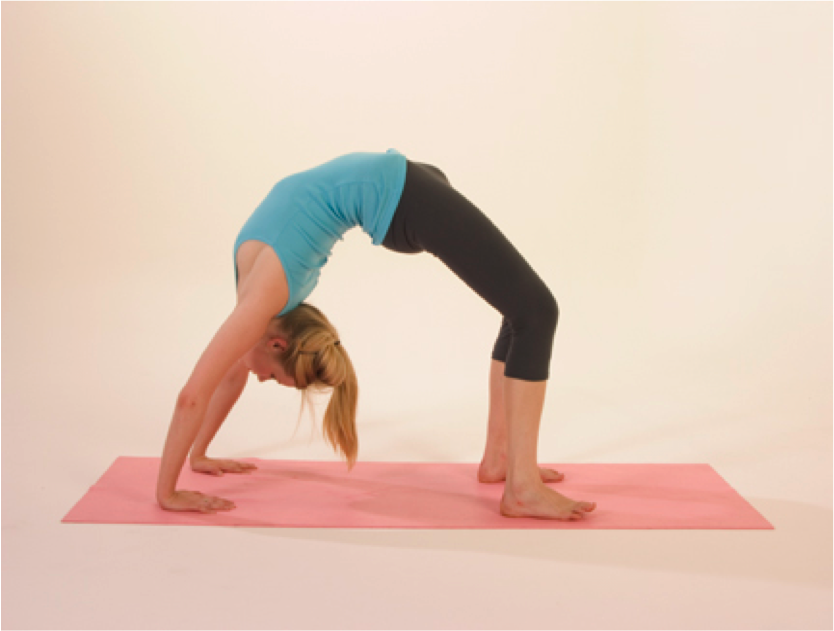 Woman doing yoga bridge pose