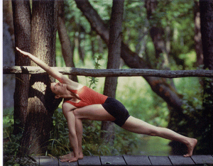 Yoga pose on wooden path