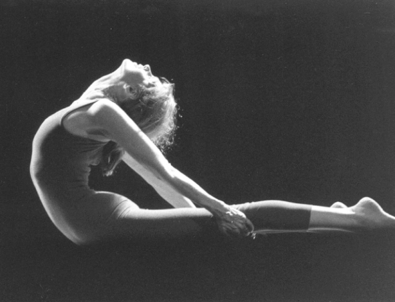 Dancer performing a graceful stretch pose