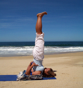 Beach yoga under clear sky