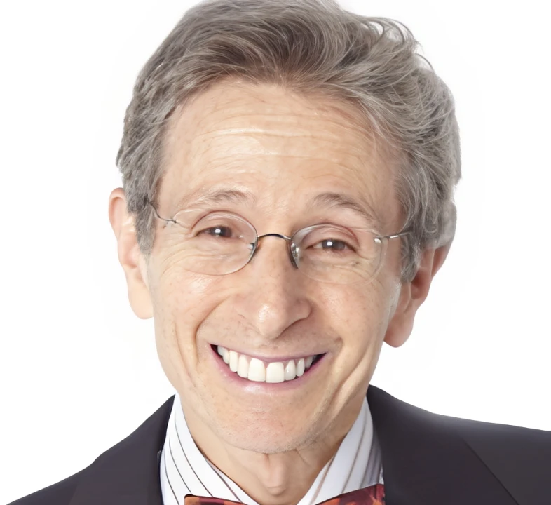 Happy man wearing a suit and glasses.