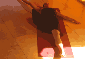 Person stretching on yoga mat