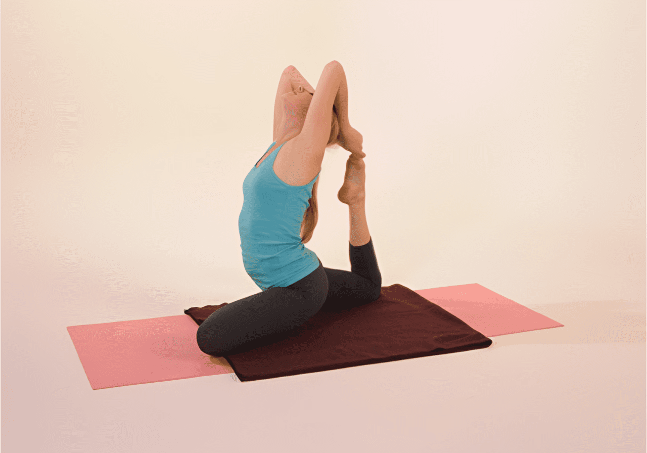 Person doing a yoga pose indoors