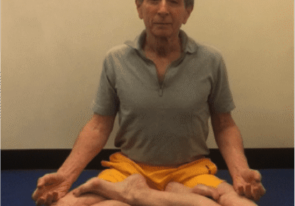 Person practicing yoga indoors