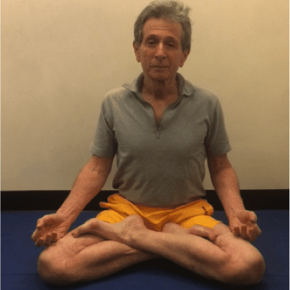 Person practicing yoga indoors