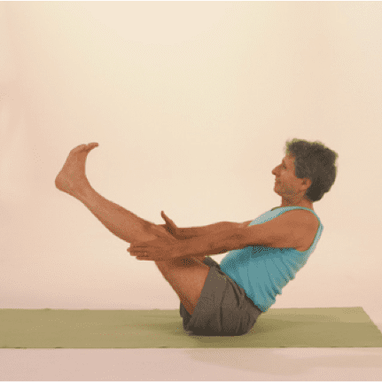 Person in boat pose exercise