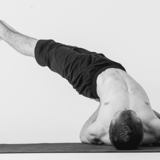 Yoga enthusiast in shoulder stand position