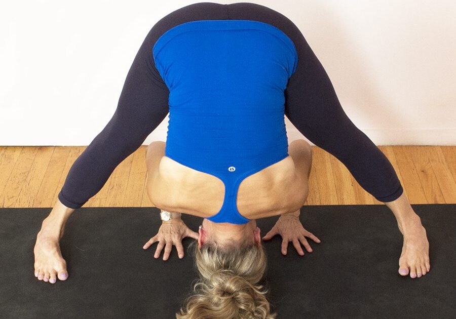 Stretching in wide-legged forward bend
