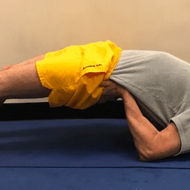 Man doing yoga bridge pose