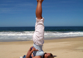 Beach yoga under clear sky