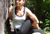 Yoga pose in lush garden setting