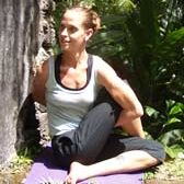 Yoga pose in lush garden setting