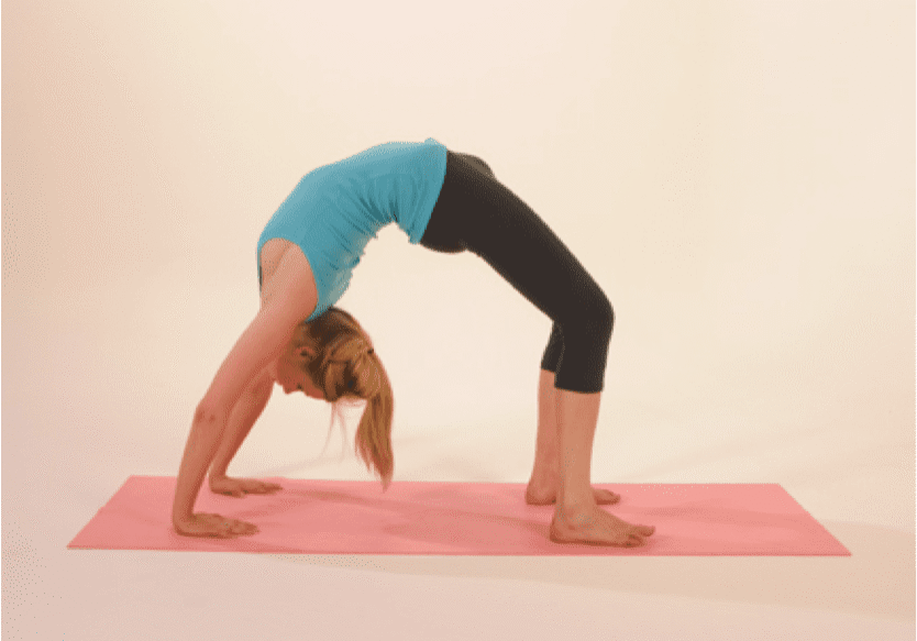 Woman doing yoga bridge pose