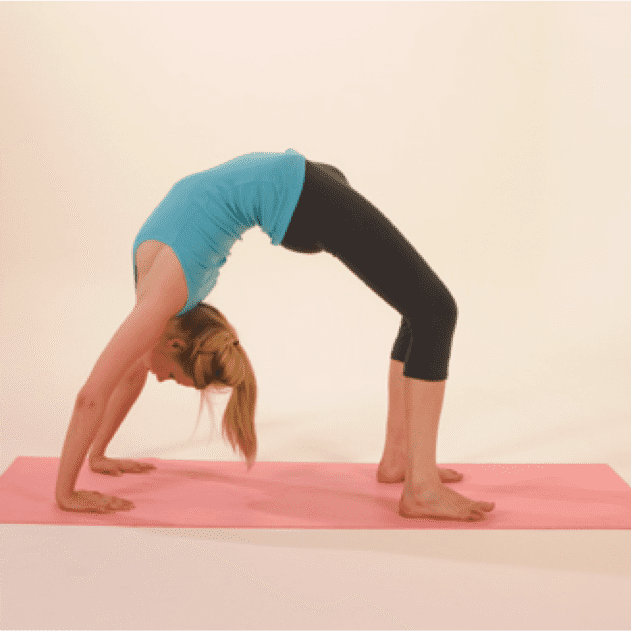 Woman doing yoga bridge pose