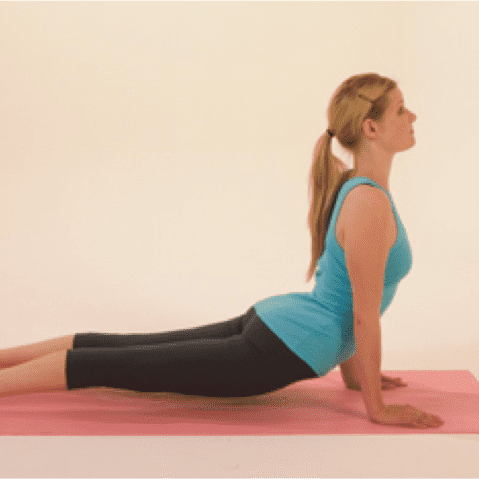 Yoga exercise on pink mat